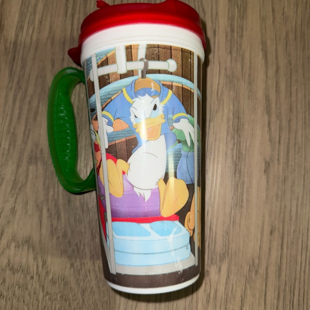 Disney Mug with Red Lid and Green Handle